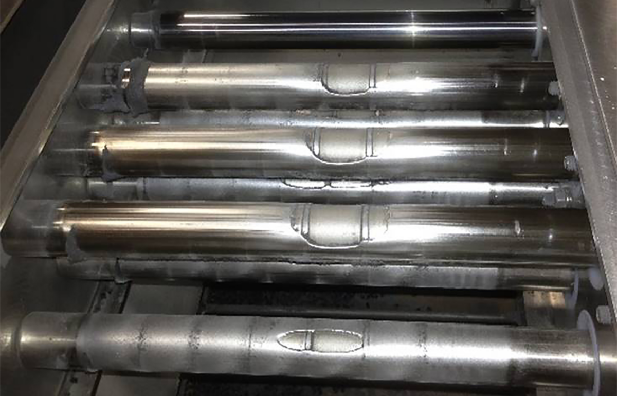 Grate magnet showing worn magnetic tubes