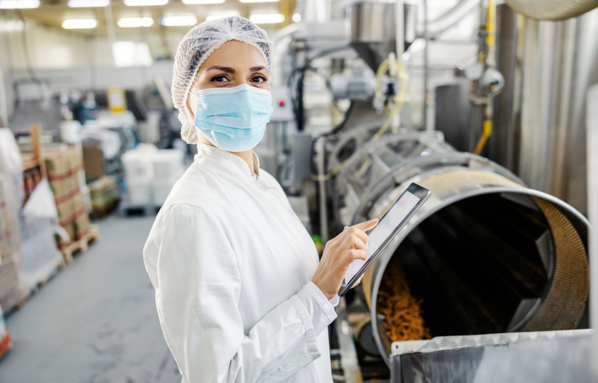 Food safety employee conducting safety audit