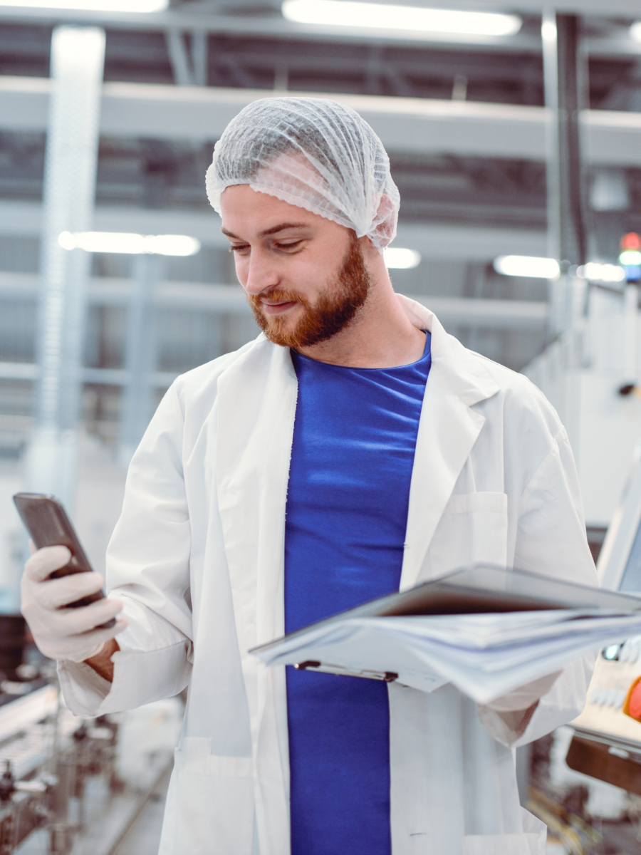 Food safety employee using mobile app for magnetic separation