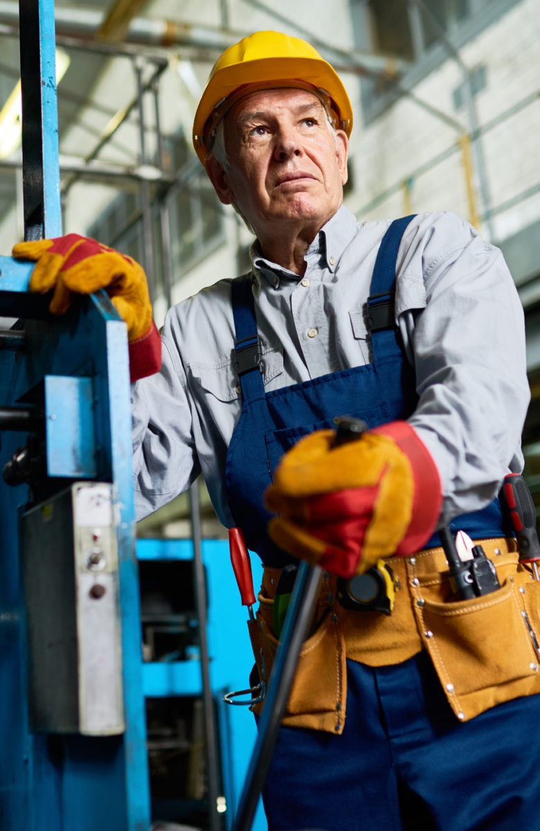 Operator at metal stamping press