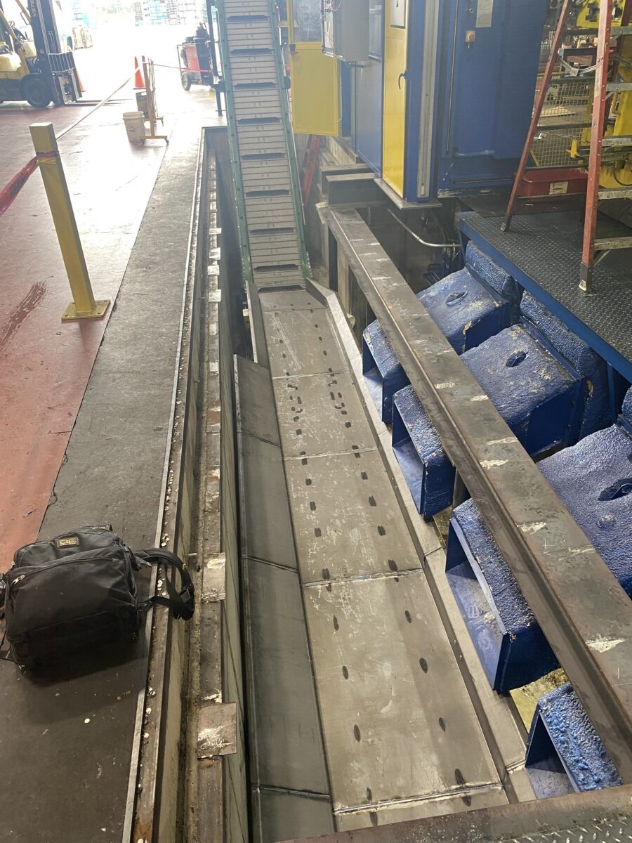 Scrap conveyor system installation