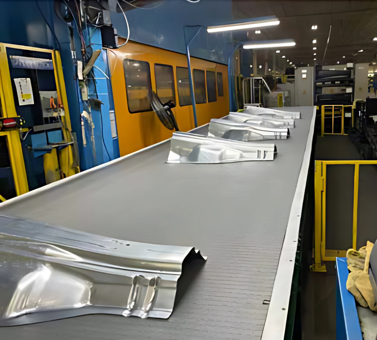MPI Part Out Conveyor Installed at Metal Forming OEM